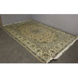 A Persian Tabriz design carpet 200cm x 300cm in good condition.