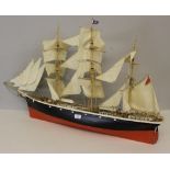 A model masted sailing ship, appears to be kit built 106cm long, some general accumulated dust,