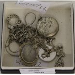 A small selection of silver and white metal jewellery, including a locket, quartz pendant/brooch,