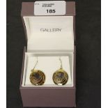 A pair of gilt metal and abalone shell 'Gallery' earrings, in branded box, good condition.