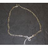 A white metal chain, with elongated oblong links, dog clasp, 50cm good used condition.