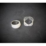 Two 925 grade white metal stone set dress rings, 9.5grams gross, one stone missing from each