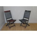 Two painted teak folding garden chairs 93cm weathered, some slight deterioration to legs