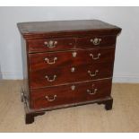 A George III mahogany chest of drawers, with two short and three long drawers, on bracket feet