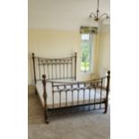 An 'And So To Bed' 5" reproduction brass effect double bedstead, in the Victorian style 142cm x