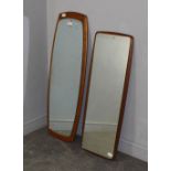 Two 1970's teak framed mirrors, of near matching design 107cm & 96cm the larger mirror with some