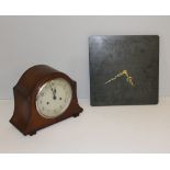 A slate wall clock, of square form, engraved with perched birds, battery movement, 30.5cm sold