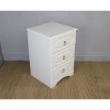 A modern white laminate bedside chest of three drawers 69cm x 46cm x 44cm some minor marks and signs