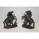 A pair of cast and black patinated spelter Marley Horse groups, 29cm some bending etc to reins,
