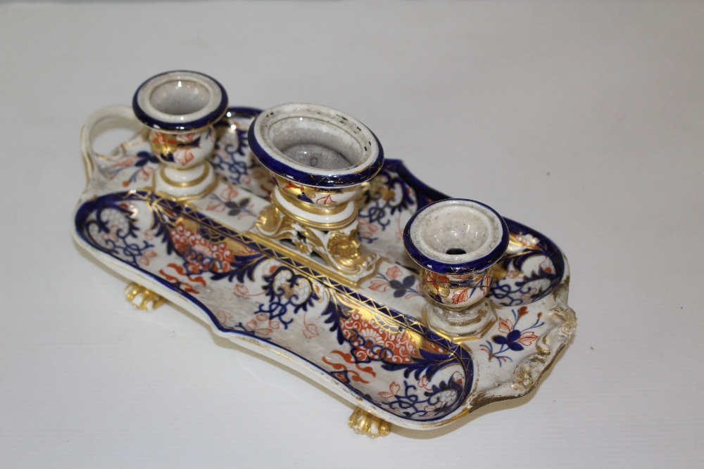 An early 19th century Derby porcelain inkstand, having three central urn-form wells flanked by - Image 2 of 4