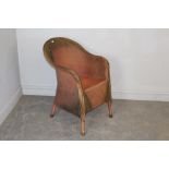 A 1930's woven-wicker armchair, in the Lloyd Loom style, painted in red and gilt 79cm generally good