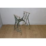 A cast-iron Jones treadle sewing machine base, later painted 71cm x 53cm x 33cm paint losses and