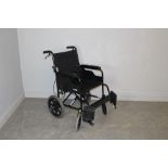 A modern 'Soma' wheelchair/mobility aid, for assisted mobility, with brakes to the handles ,