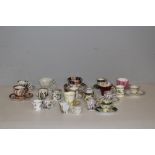 A selection of porcelain cabinet cups and saucers, various sizes, makers and designs.