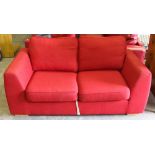 A modern red material bed settee 176cm marks and scratches.