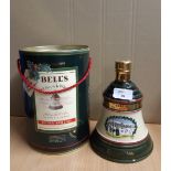 75cl Bells Christmas 1989 blended Scotch Whisky decanter, with gift tin