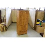 An Alstons rustic pine effect double wardrobe, with base drawer 184cm x 78cm x 52cm good condition.