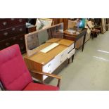A 1980's laminate dressing table 106cm x 135cm x 42.5cm