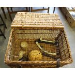 A wicker picnic hamper containing five 'Eastern' items