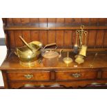 A brass coal helmet, companion set, copper kettle, toasting fork and a small brass KSIA style dish.