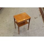 A modern mahogany two-tier occasional table, 60cm x 44.5cm x 35cm good condition.