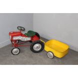 A vintage 1960's Tri-ang/Triang child's pedal tractor, with yellow painted trailer. Original
