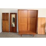 A 1970's Heals teak wardrobe, with quadruple panelled doors 182cm x 122cm x 57cm lacking fixings and