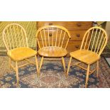 An Ercol light elm stick-back armchair, with shaped tub-form top rail 78cm together with two light