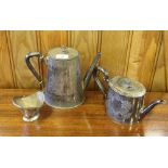 A silver plated coffee pot, tea pot and coal helmet form sugar bowl with associated spoon/shovel,