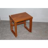 A 1960's Nest of two teak tables, label to underside 'Furniture By Mcintosh', the largest