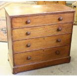 A Victorian oak chest of drawers, the rectangular top above four graduating long drawers, each