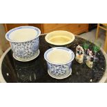 Two Chinese blue and white design planters and stands (modern) a stoneware planter, two