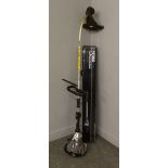 A Titan petrol strimmer with Titan pole pruner attachment. used condition, appears good.