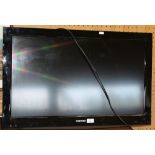 A 32" Toshiba flatscreen television, used condition, lacking stand.