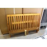 A modern pine double bed, with slatted base and mattress, used condition.