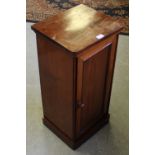 A Victorian mahogany pot cupboard with panelled door and plinth base 81cm x 38cm x 33.5cm marks