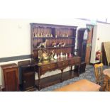 Titchmarsh and Goodwin panelled oak dresser of 18th Century design, 184cm wide x 50cm deep x 188cm