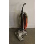 A Kirby Heritage vacuum cleaner with two boxes of attachments, cleaner requires a new belt.
