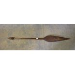 A Polyneasian style carved ornamental paddle 149cm minor marks and scratches.