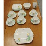 A Shelley Art Deco design tea service, twenty pieces hand-decorated with a crocus design,