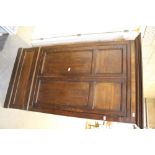 A 19th century panelled oak and mahogany hall cupboard 194cm x 112cm x 50cm used condition, some