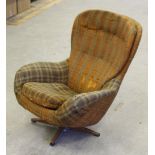 A 1970's swivel egg chair, most likely British, 88cm, in poor overall condition, requiring full re-