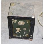 A Victorian green-painted Samuel Withers & Co safe, with pinstriped detail, retaining key 51cm x