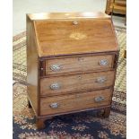 An Edwardian inlaid-mahogany bureau, the top with applied and engraved presentation inscription (see