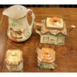 A Price Kensington cottage ware jug and a three piece cottage ware teaset