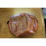 A Maxwell Scott Italian leather wash bag, in chestnut brown 22cm used but generally good.