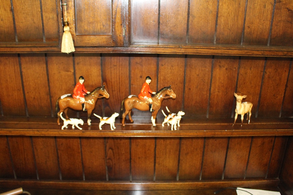 Two Beswick pottery huntsmen (one modern), four Beswick hounds, and a Beswick deer, all in good - Image 2 of 4