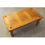 A modern imported pine rectangular coffee table, the top with three panels 41cm x 110cm x 61.5cm