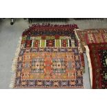 A group of five eastern design rugs/hangings of chain type stitching/embroidery, in good condition.