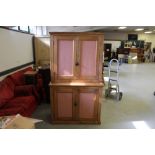 A reclaimed pine kitchen press, with red gingham inset panelled doors 193cm x 112cm x 46cm Good